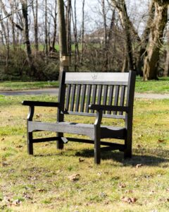 The commercial park bench is weather-resistant and comes in blue, red, green and black. Each bench comes with four ground anchors.