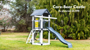 The Care-Bear Castle swing set has swings on both sides of the tower to maximize a small yard. It has a waterfall slide, rock climbing wall/ladder combo, and two belt swings. The ship’s wheel, telescope, and tic-tac-toe are also included. Choose white swing set with gray decking or ivory swing set with brown decking. Recommended ages 2-10 years old. Price as pictured $4,598.00 - not including delivery and installation.