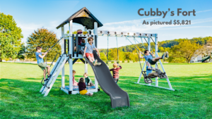 The Cubby’s Fort includes a checkerboard sandbox cover, ship’s wheel, and telescope. Also includes a monkey bar swing beam with a belt swing, trapeze bar, and plastic glider. Comes in white swing set with gray decking or ivory swing set with brown decking. Recommended ages 2-10 years old. Price as pictured $5,821.00 - not including delivery and installation.